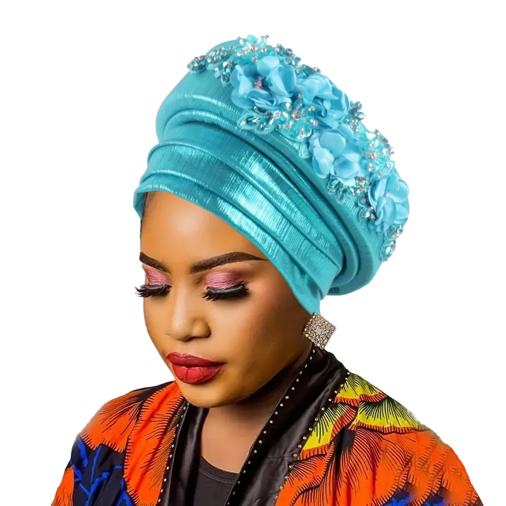 Африканский женский тюрбан с бриллиантовым цветком - Фотография_6