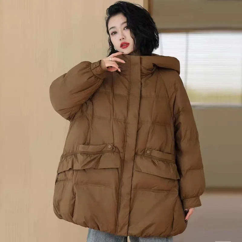 Женская куртка-пуховик с капюшоном - Фотография_3