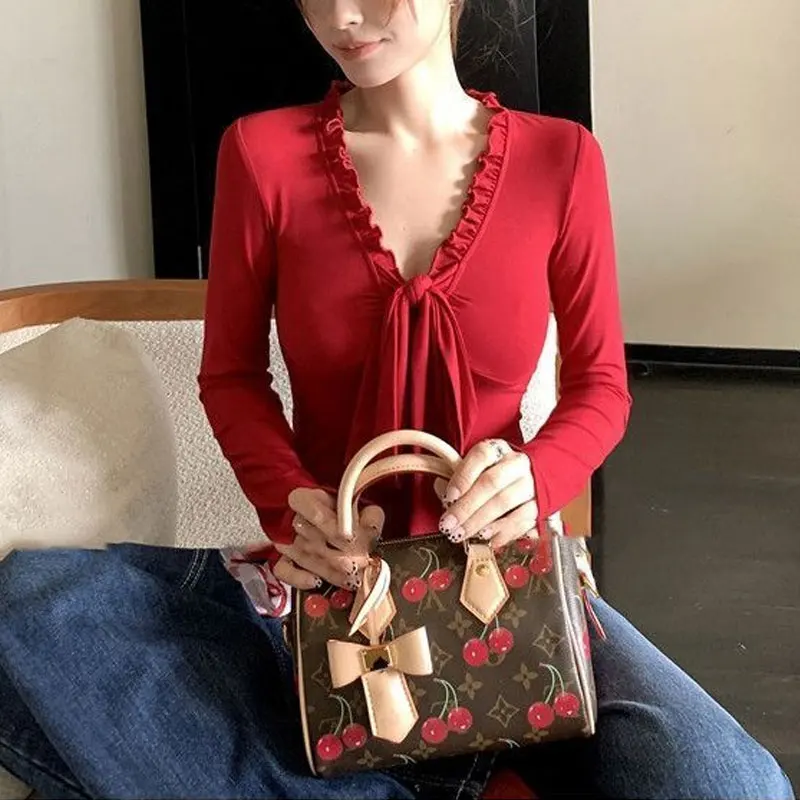 Модные пуловеры с v-образным вырезом и бантом на шнурке - Фотография_3