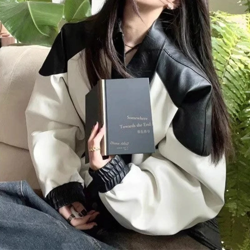 Американская винтажная черно-белая кожаная мотоциклетная куртка для женщин - Фотография_2