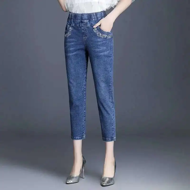 Винтажные женские джинсовые брюки с вышивкой - Фотография_5