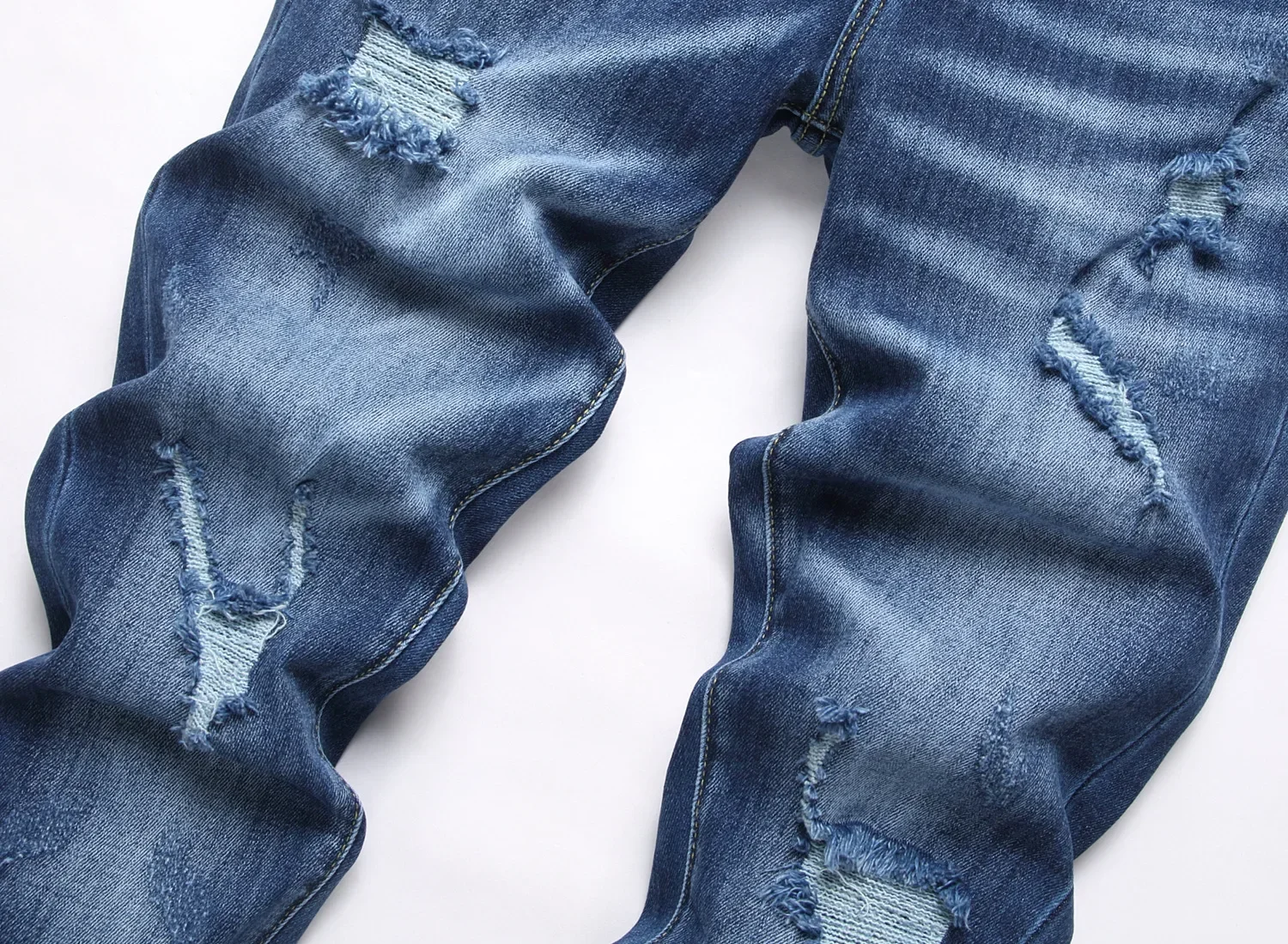 Мужские рваные джинсы - Фотография_5