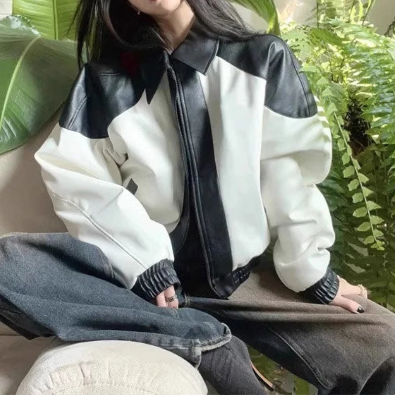 Американская винтажная черно-белая кожаная мотоциклетная куртка для женщин - Фотография_4