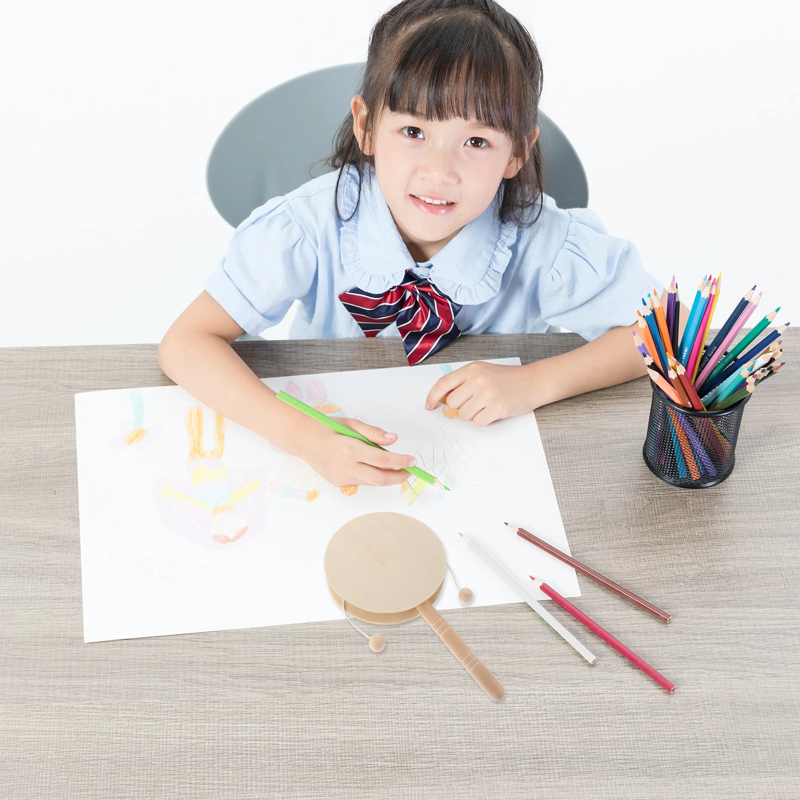 Неокрашенные деревянные погремушки