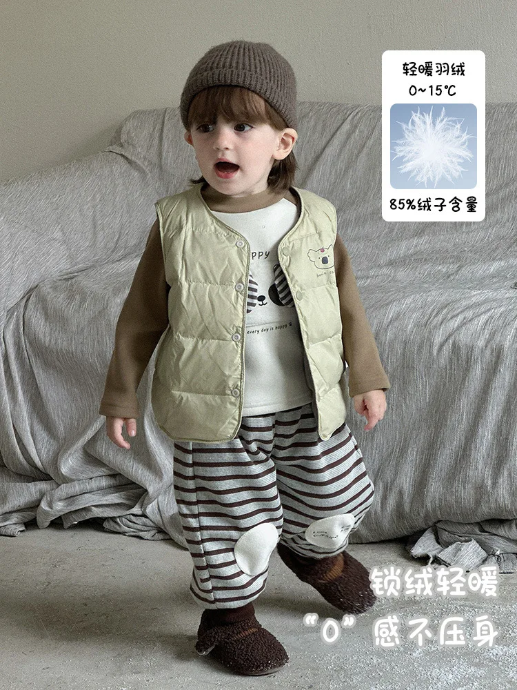 Детский пуховый жилет с героями мультфильмов - Фотография_2