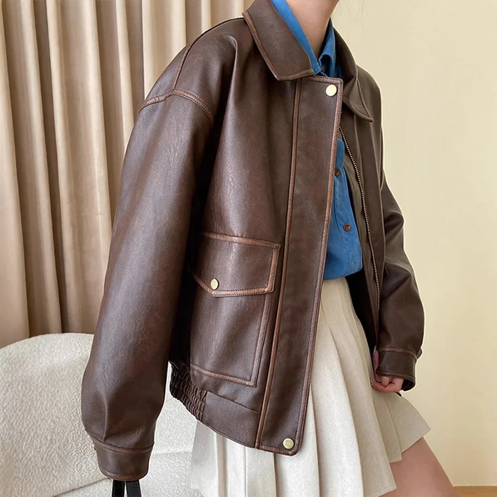 Коричневая кожаная куртка - Фотография_4