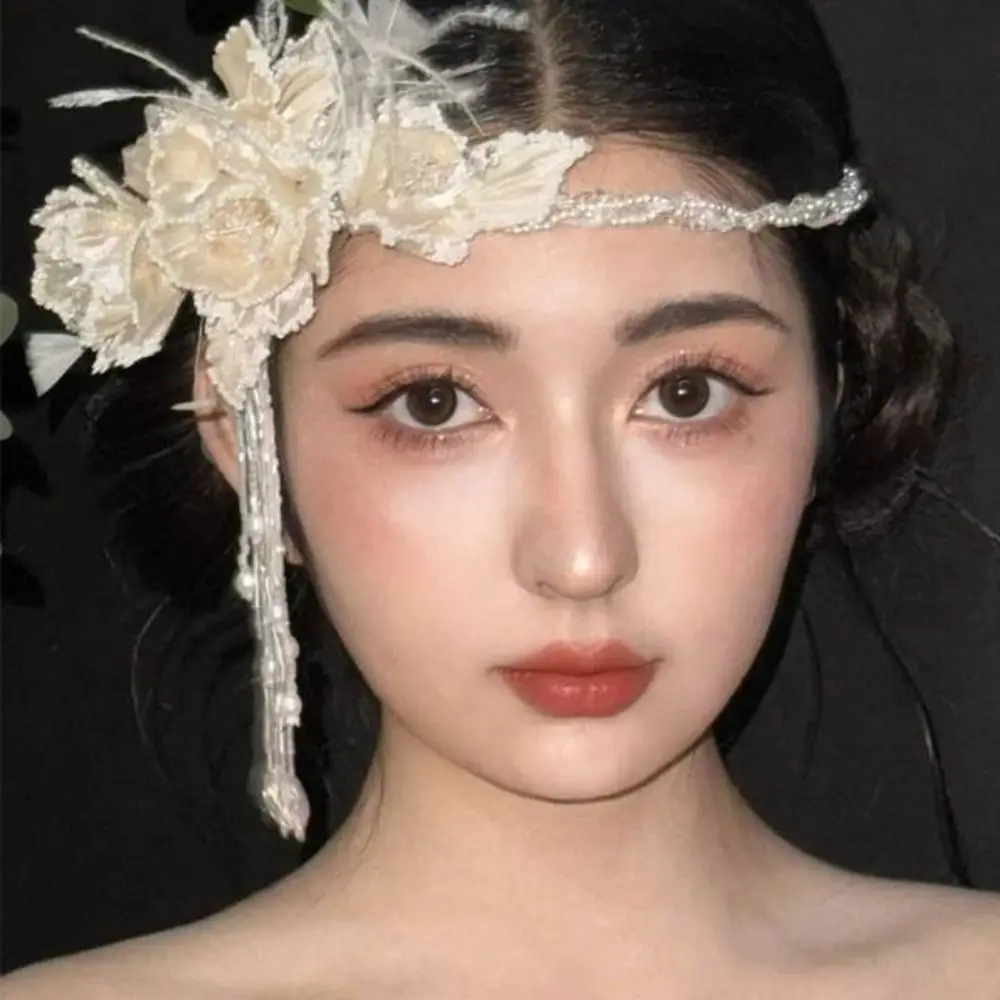 Изысканные свадебные повязки на голову с перьями и жемчугом - Фотография_2