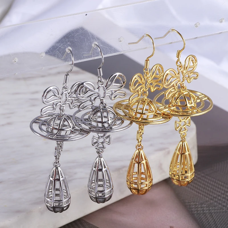 Hq полые серьги с бантом - Фотография_3