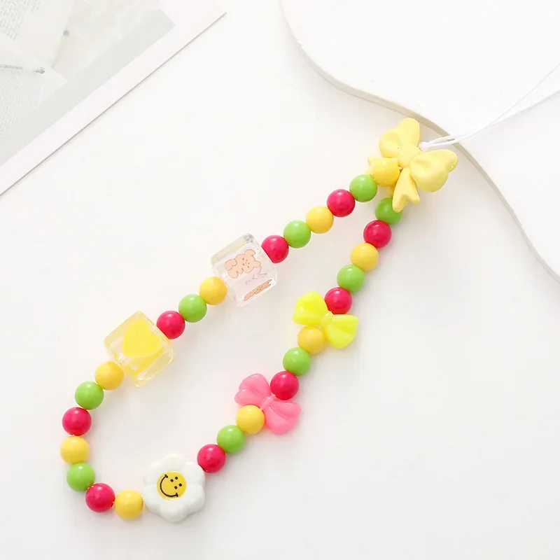 Модная подвесная цепочка для телефона с карамелками и бабочкой - Фотография_4