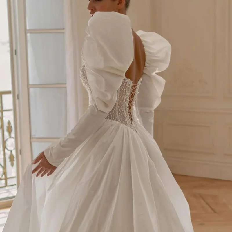 Белые свадебные платья с открытыми - Фотография_4