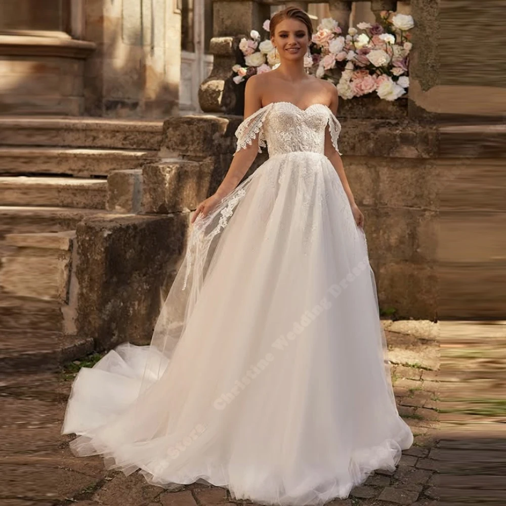 Женские свадебные платья трапециевидной формы с открытыми плечами - Фотография_3