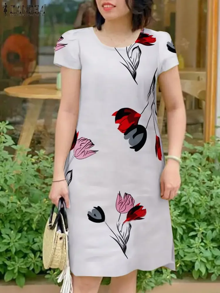 Летнее элегантное платье с цветочным принтом и короткими рукавами