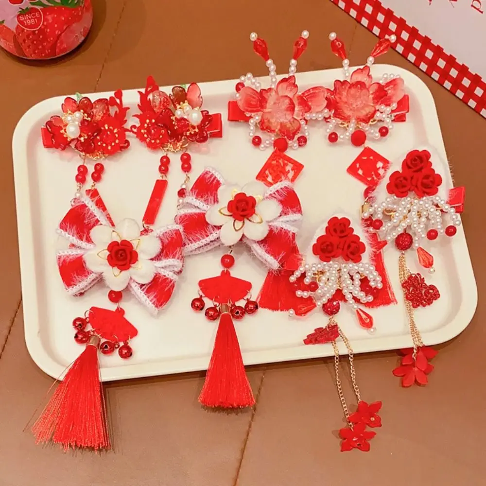 Детская красная заколка с кисточками и бантом - Фотография_2