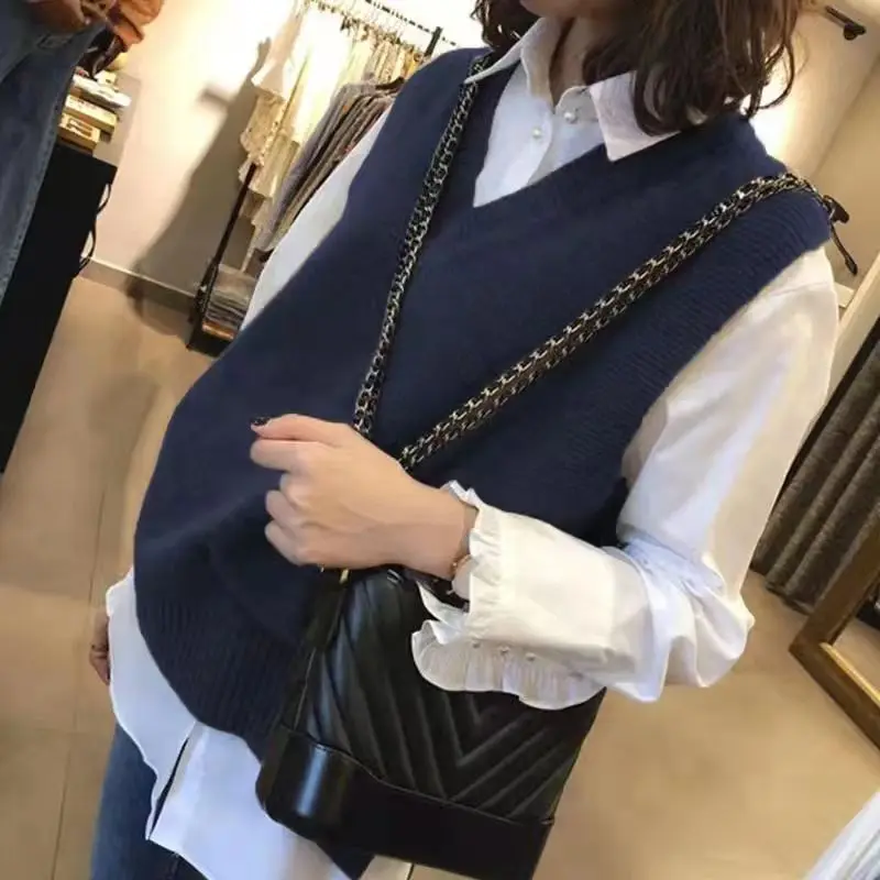 Вязаный жилет без рукавов