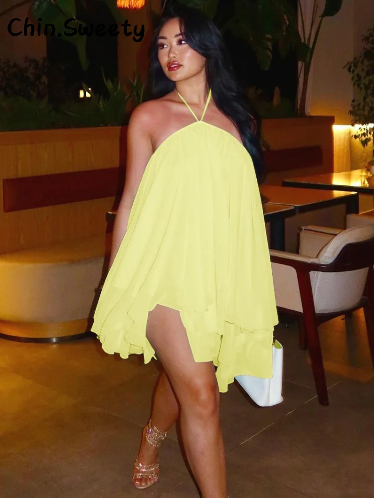 Элегантное короткое платье с лямкой на шее и оборками - Фотография_4