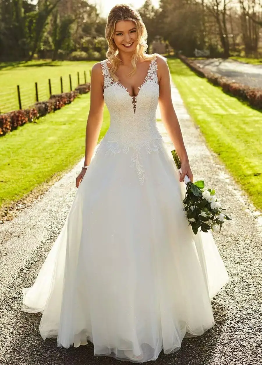 Роскошные свадебные платья для невесты без рукавов с v-образным вырезом