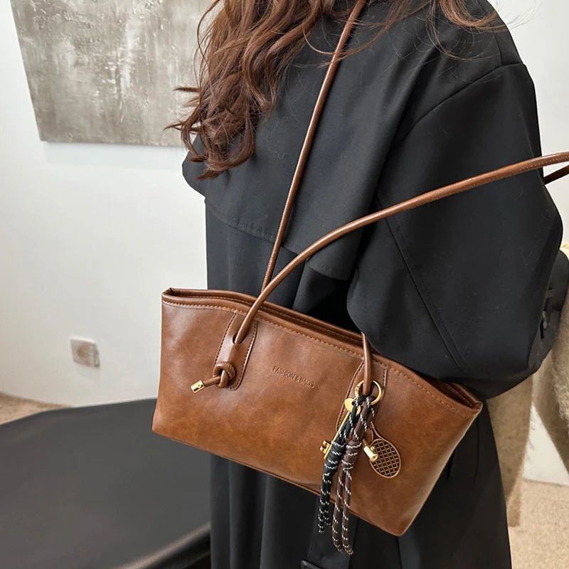 Женская дорожная сумка через плечо с узлом - Фотография_5