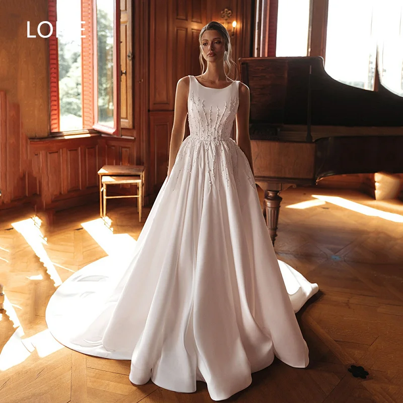 Lorie свадебное платье трапециевидной формы с аппликацией и лямкой на шее